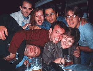 Group with beer on boat!